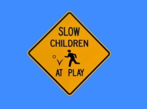 slow children at play road sign