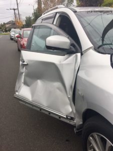 damaged door on car